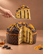 Panettone artigianale fondente arancia e rum con burro di bufala Tenuta Agrilat - la fetta con gli ingredienti